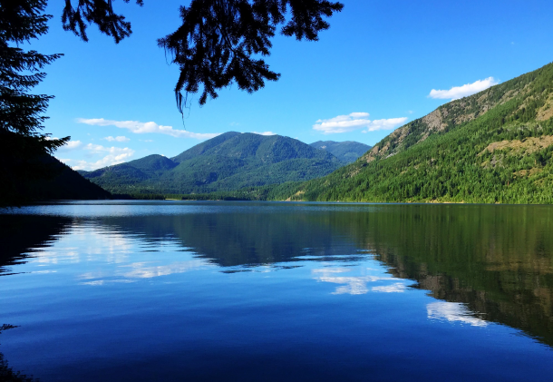 sullivan lake with mountains visible in the background