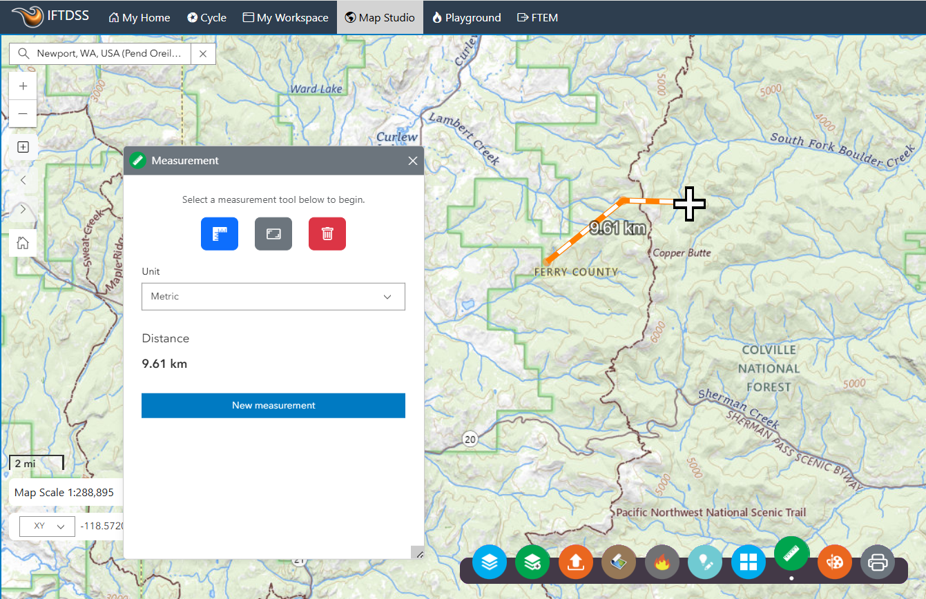 orange and white line indicating a distance is being measured. After double left clicking, the distance appears in the Measurement widget box and on the map.