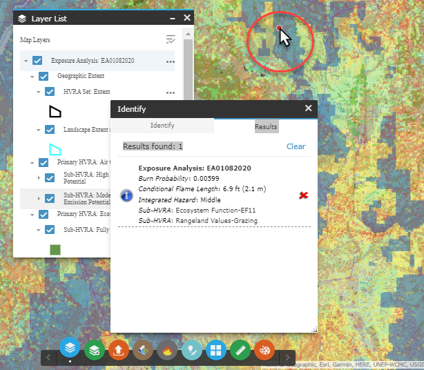 Exposure Analysis output with the probability, conditional flame length, and integrated hazard for a specific point being listed after clicking with the "Identify" widget.